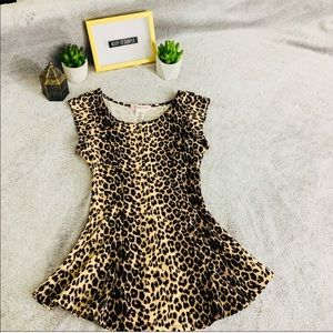 Purple Snow Leopard print peplum top